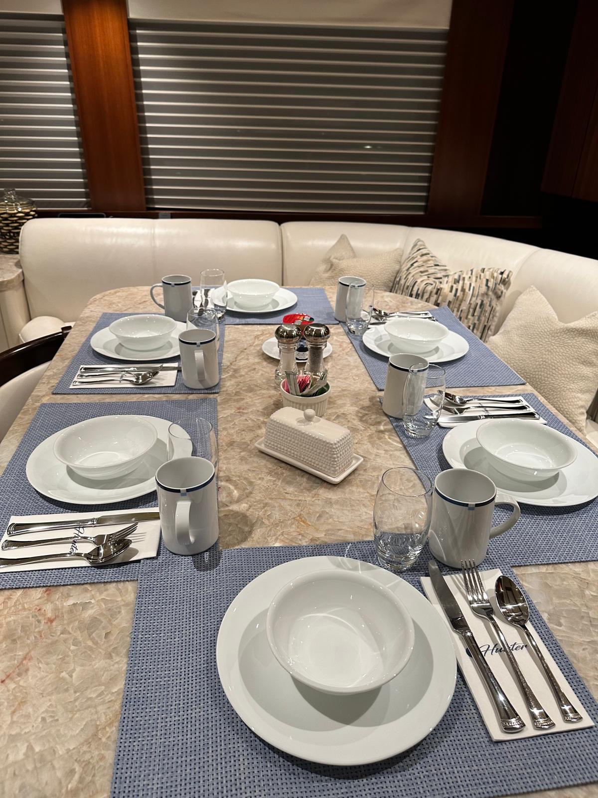 Breakfast table arranged aboard a yacht